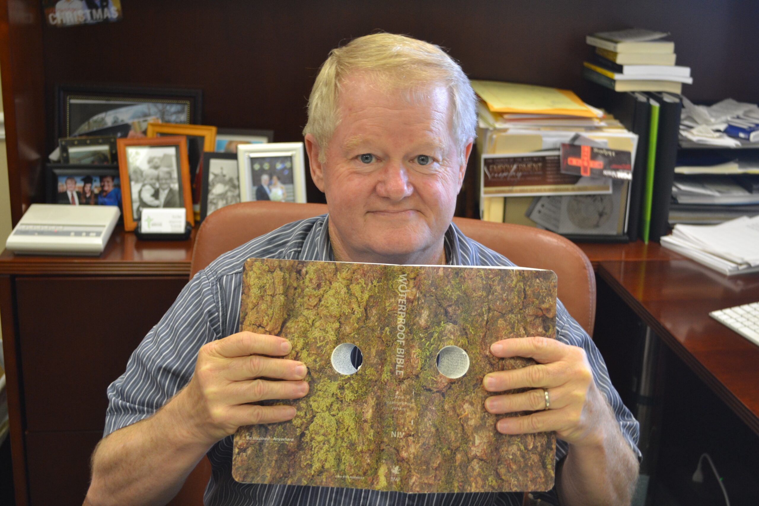 Tracy uses this Bible with eye-holes drilled in to remind him to look at the world through the lens of scripture and not through his own eyes.